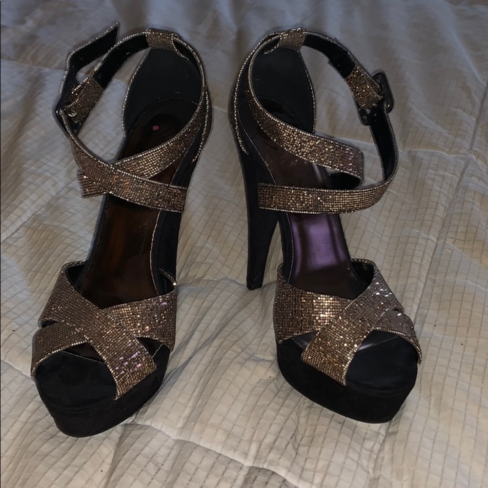 Gold and black shoes